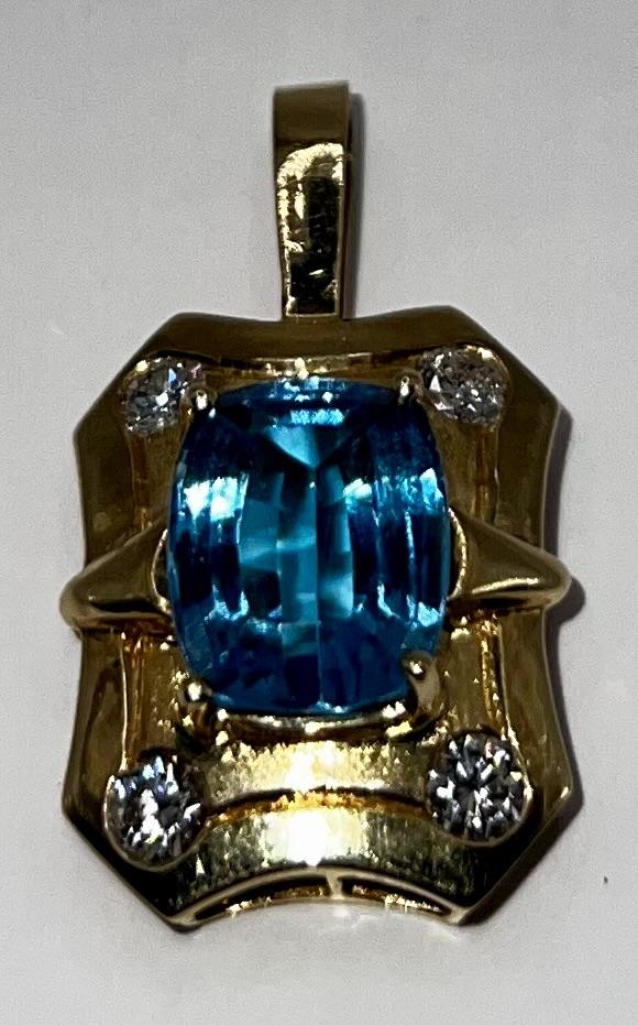 Blue Topaz and Diamond Pendant