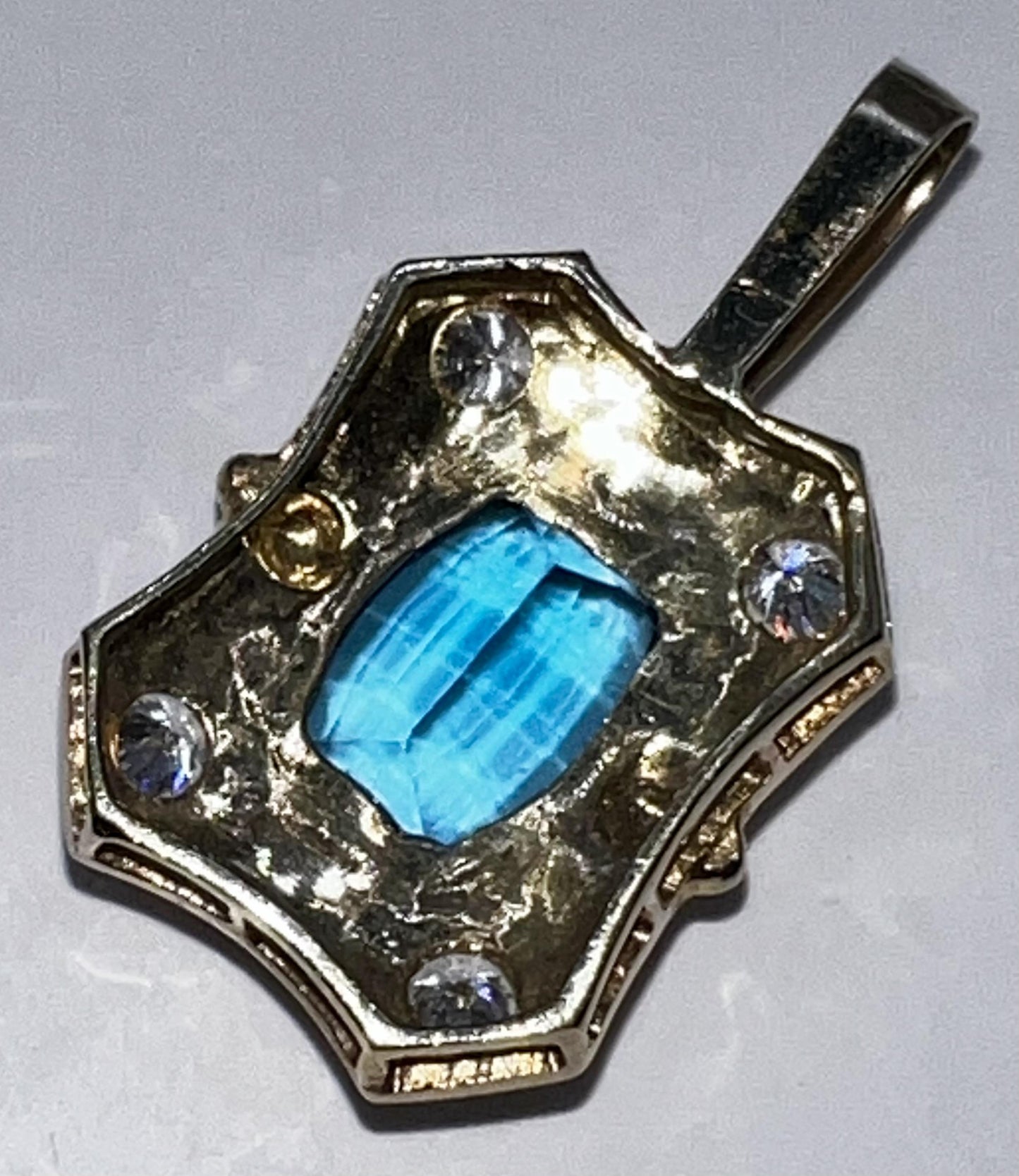 Blue Topaz and Diamond Pendant