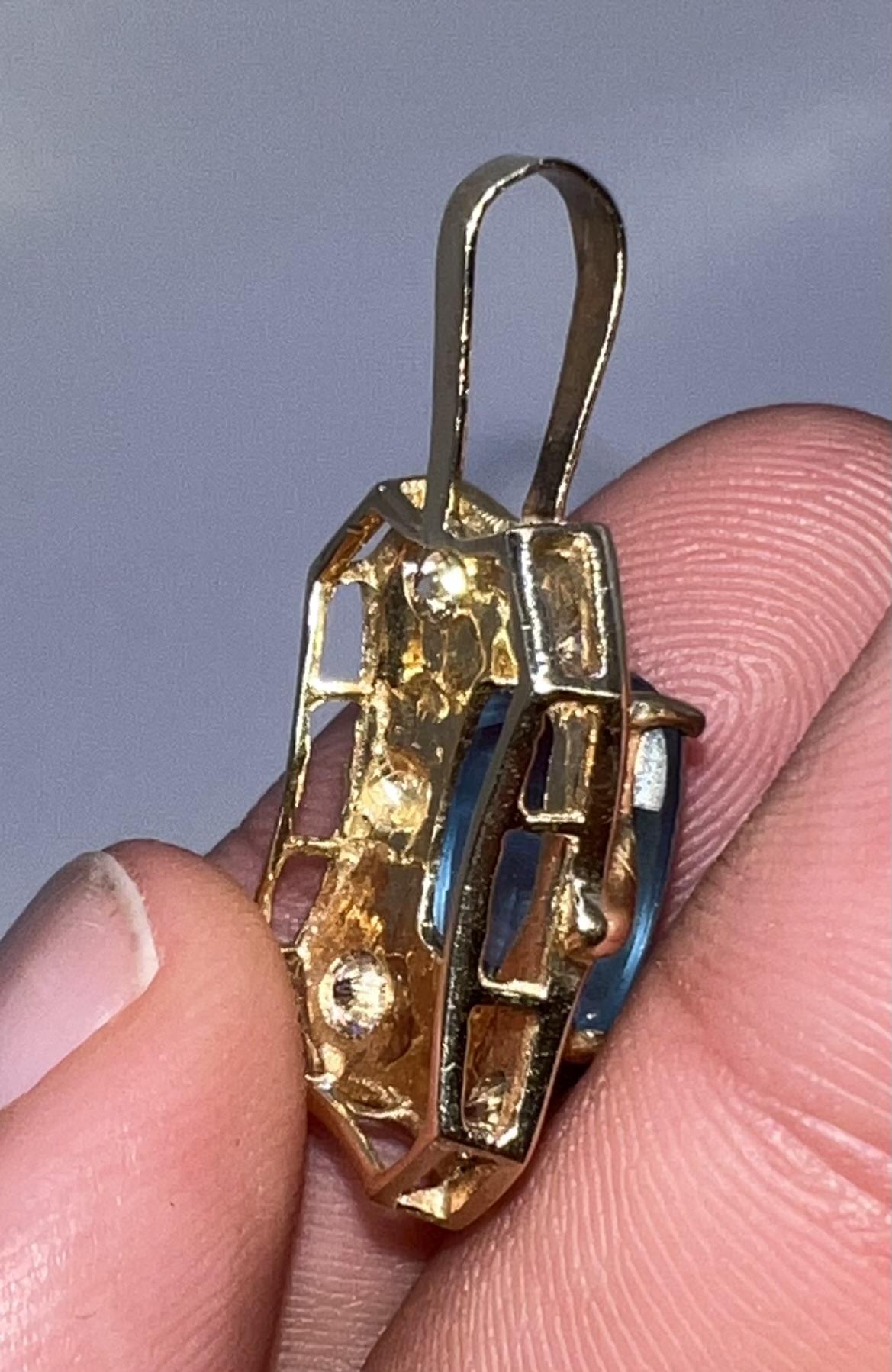 Blue Topaz and Diamond Pendant