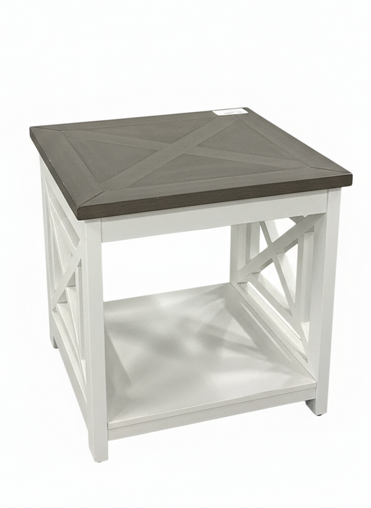 White side table with a dark brown top on a white background