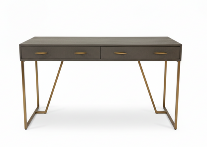 Dark brown desk with gold legs on a white background