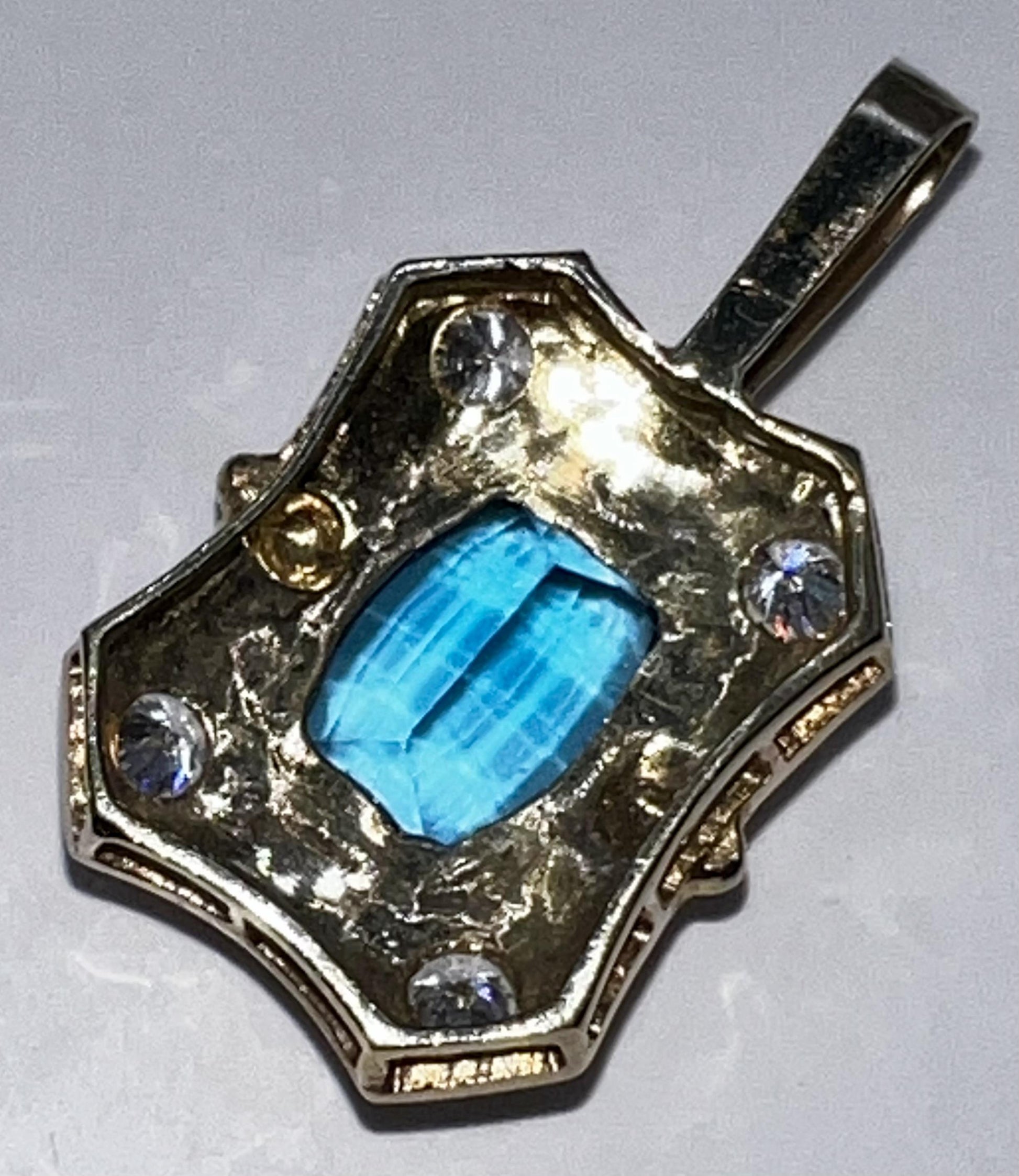 Blue Topaz and Diamond Pendant