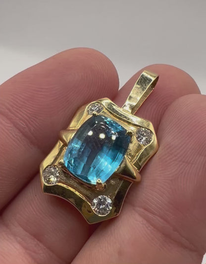 Blue Topaz and Diamond Pendant